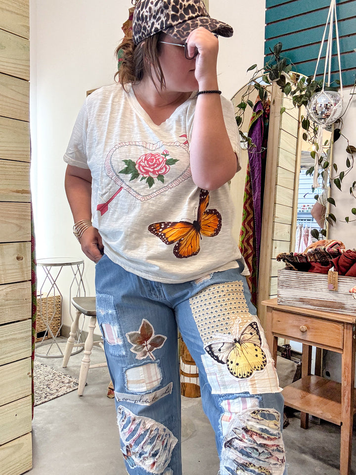 Distressed Patched Jeans with Butterfly Appliqué - Paper Lace