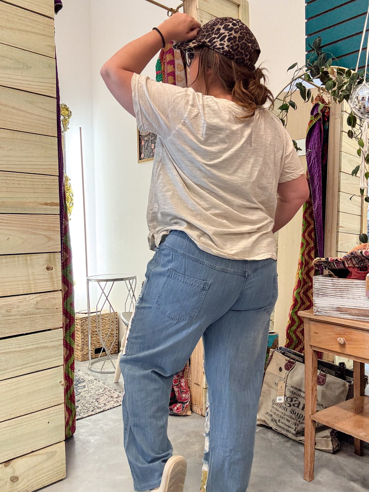 Distressed Patched Jeans with Butterfly Appliqué - Paper Lace